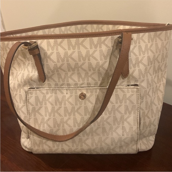 Michael Kors tote/shoulder bag. Ivory leather with rich brown straps. 16” x 10” - Picture 4 of 4